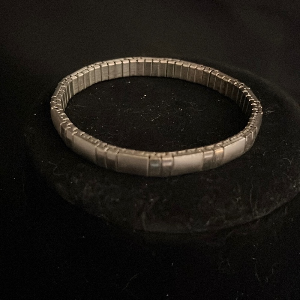 Silver-tone stretch Bangle Bracelet.